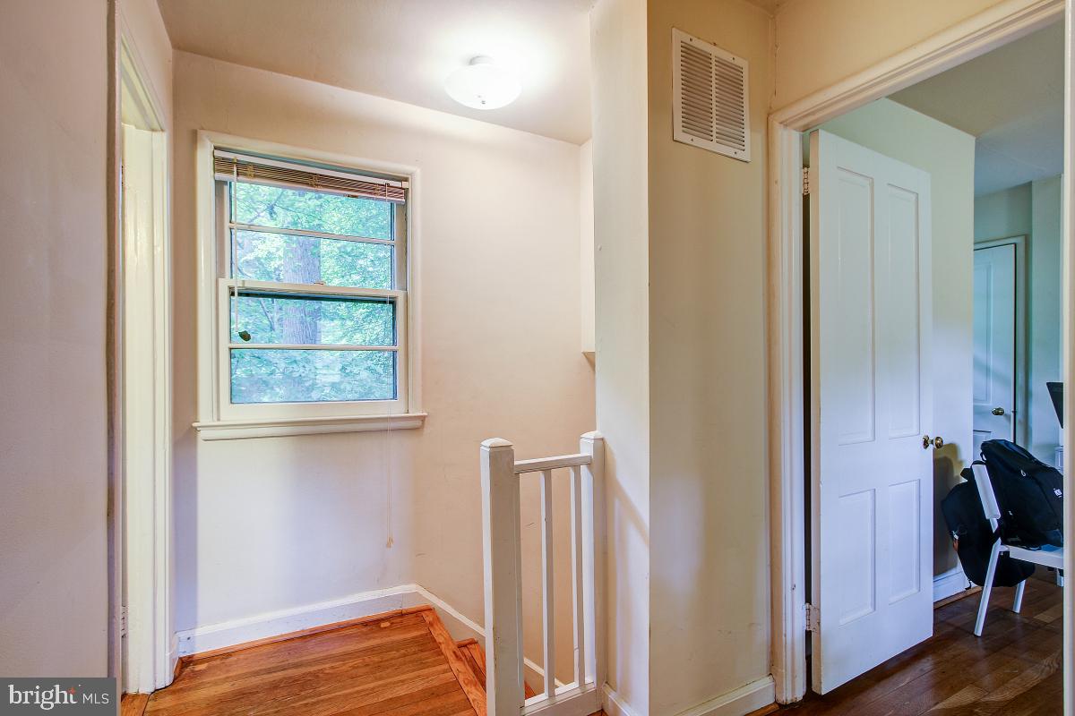8621 Geren Road, Unit 297 Silver Spring, MD 20901 - Photo 17 of 30 Upstairs Landing to Bath and Two Bedrooms