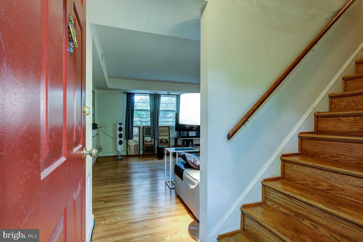 8621 Geren Road, Unit 297 Silver Spring, MD 20901 - Photo 4 of 30 Foyer entry leads to an open Living Room