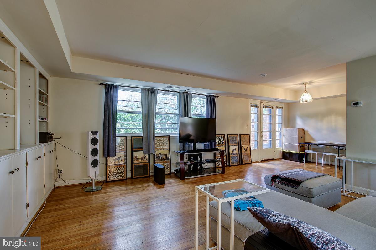 8621 Geren Road, Unit 297 Silver Spring, MD 20901 - Photo 5 of 30 The Living Room has new windows facing parkland