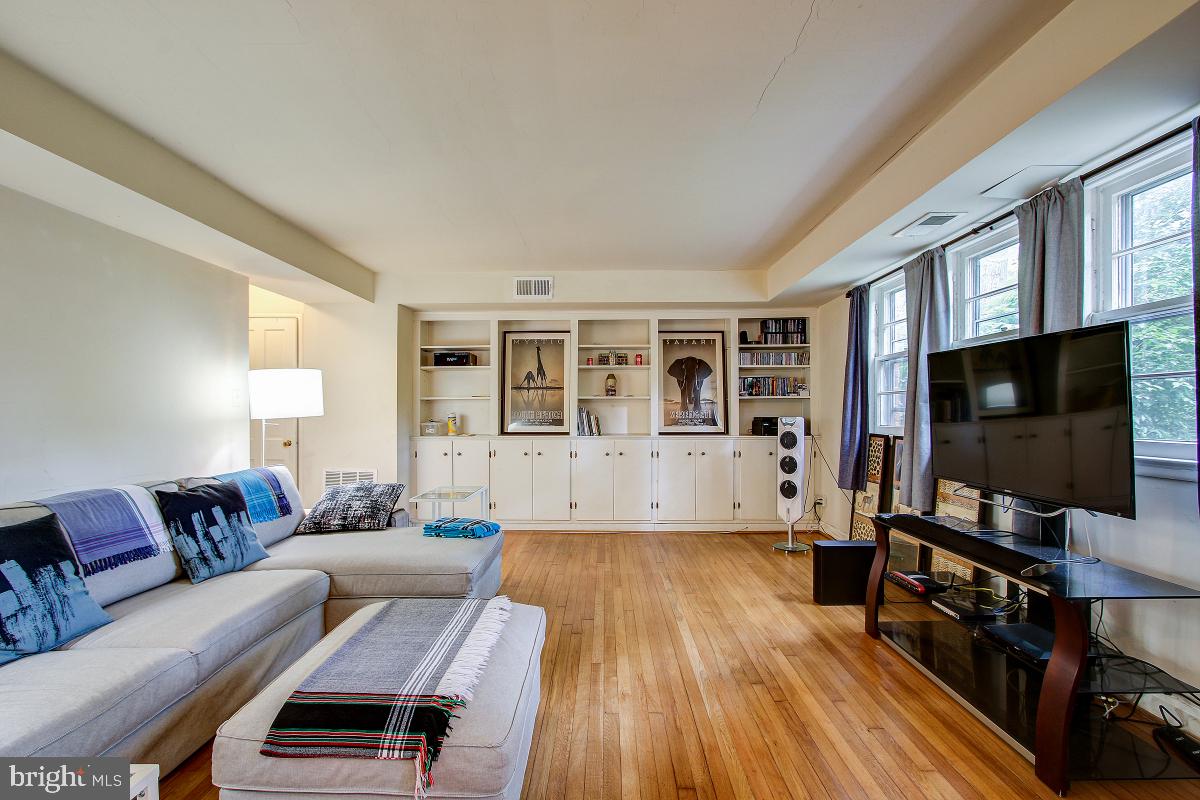 8621 Geren Road, Unit 297 Silver Spring, MD 20901 - Photo 7 of 30 Open Living Room with NEW WINDOWS