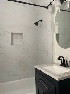 a bathroom with a toilet and a window