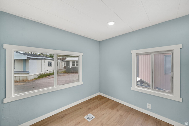 200 North Harrisville Road, Unit 37 Ogden, UT 84404 - Photo 9 of 14 Empty room with light wood-style flooring