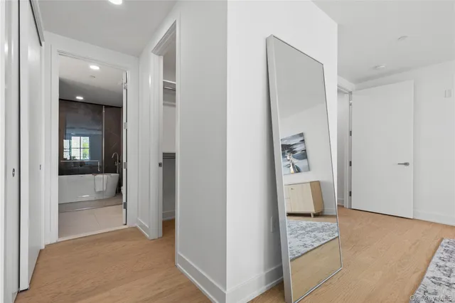 a view of livingroom with hardwood floor and hallway