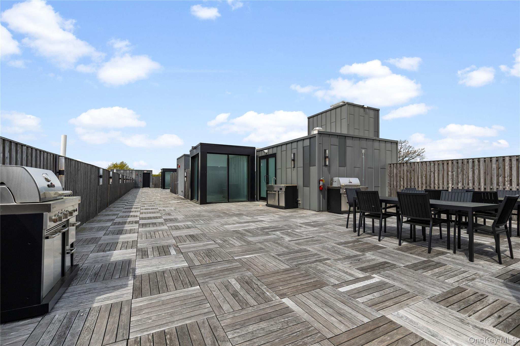 33 Calvert Street, Unit TH6 Harrison, NY 10528 - Photo 14 of 16 a view of a terrace with dining space