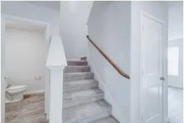 a picture of a bathroom with a shower