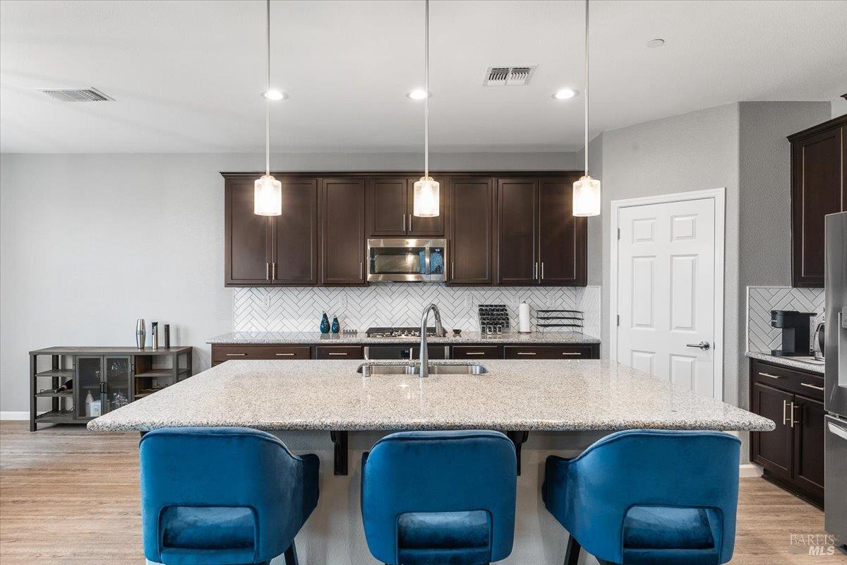2180 Karen Place Rohnert Park, CA 94928 - Photo 11 of 48 a kitchen with a sink a counter space appliances and cabinets