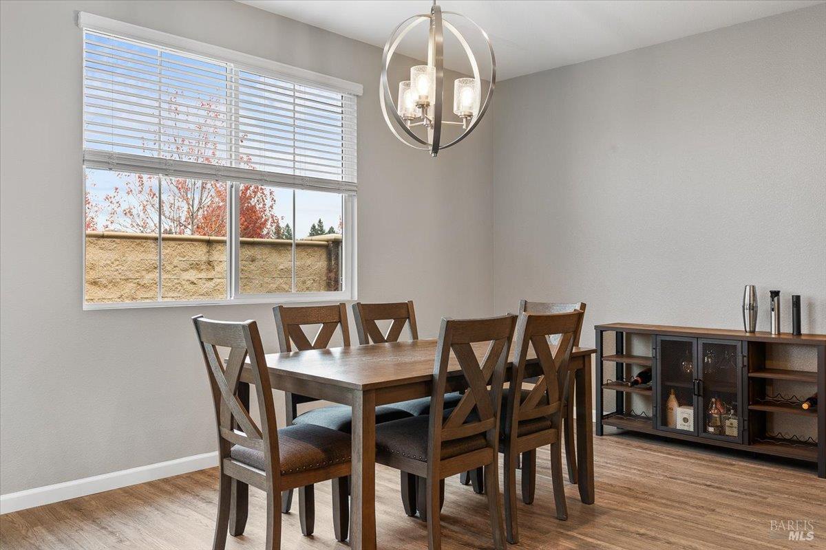 2180 Karen Place Rohnert Park, CA 94928 - Photo 15 of 48 a view of a dining room with furniture and wooden floor