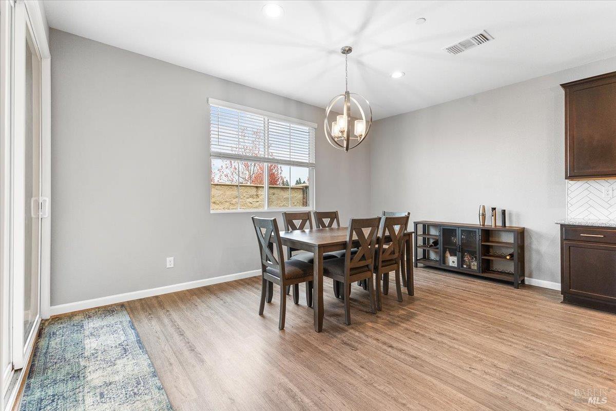 2180 Karen Place Rohnert Park, CA 94928 - Photo 16 of 48 a view of a dining room with furniture window and wooden floor