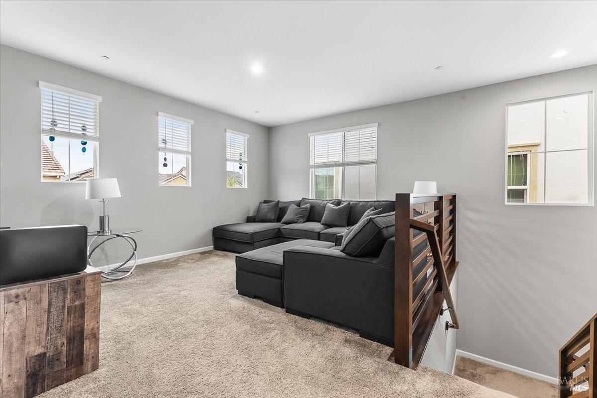 2180 Karen Place Rohnert Park, CA 94928 - Photo 18 of 48 a living room with furniture a flat screen tv and a window