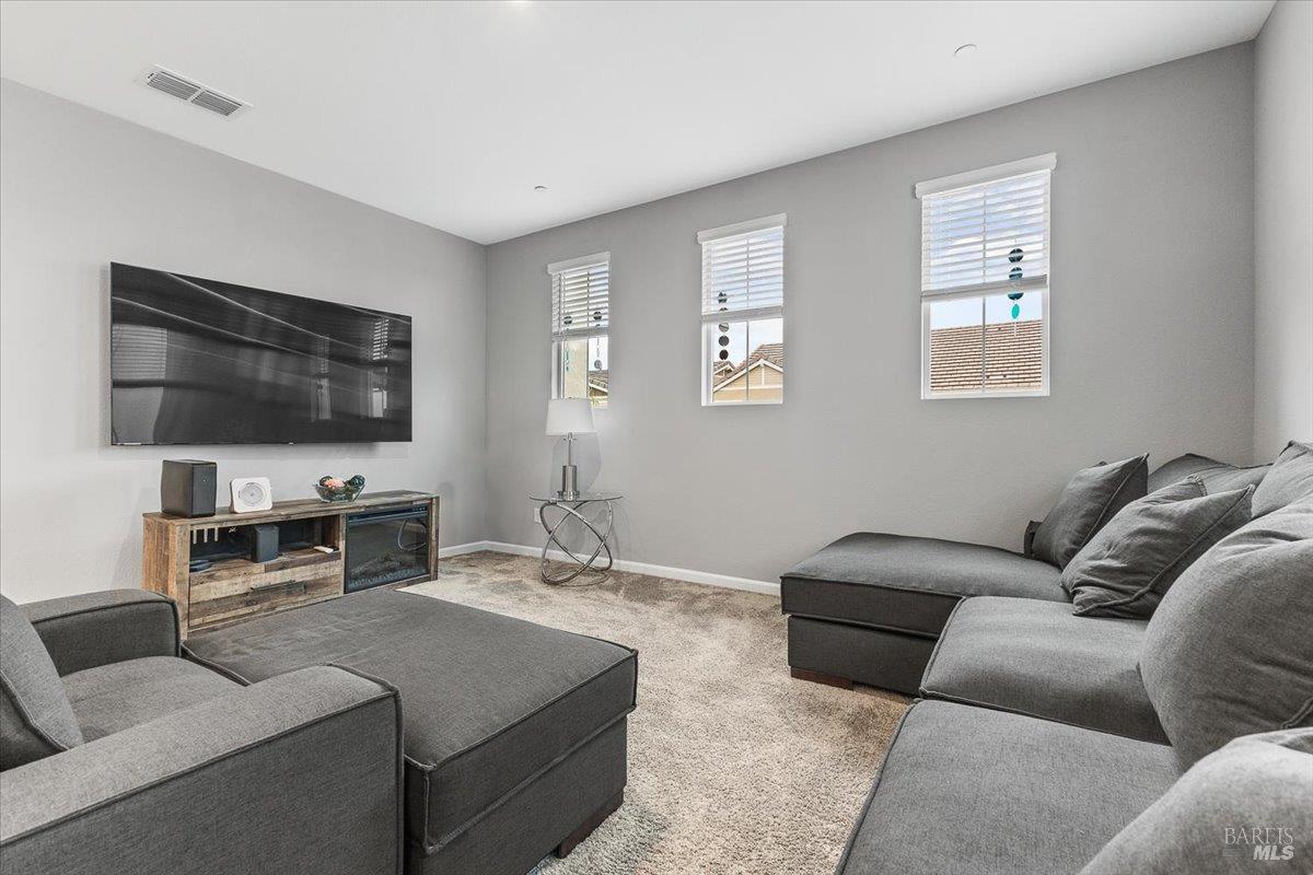 2180 Karen Place Rohnert Park, CA 94928 - Photo 20 of 48 a living room with furniture and a flat screen tv