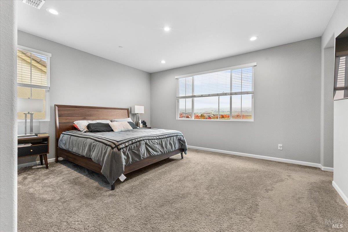 2180 Karen Place Rohnert Park, CA 94928 - Photo 22 of 48 a bedroom with a bed and window