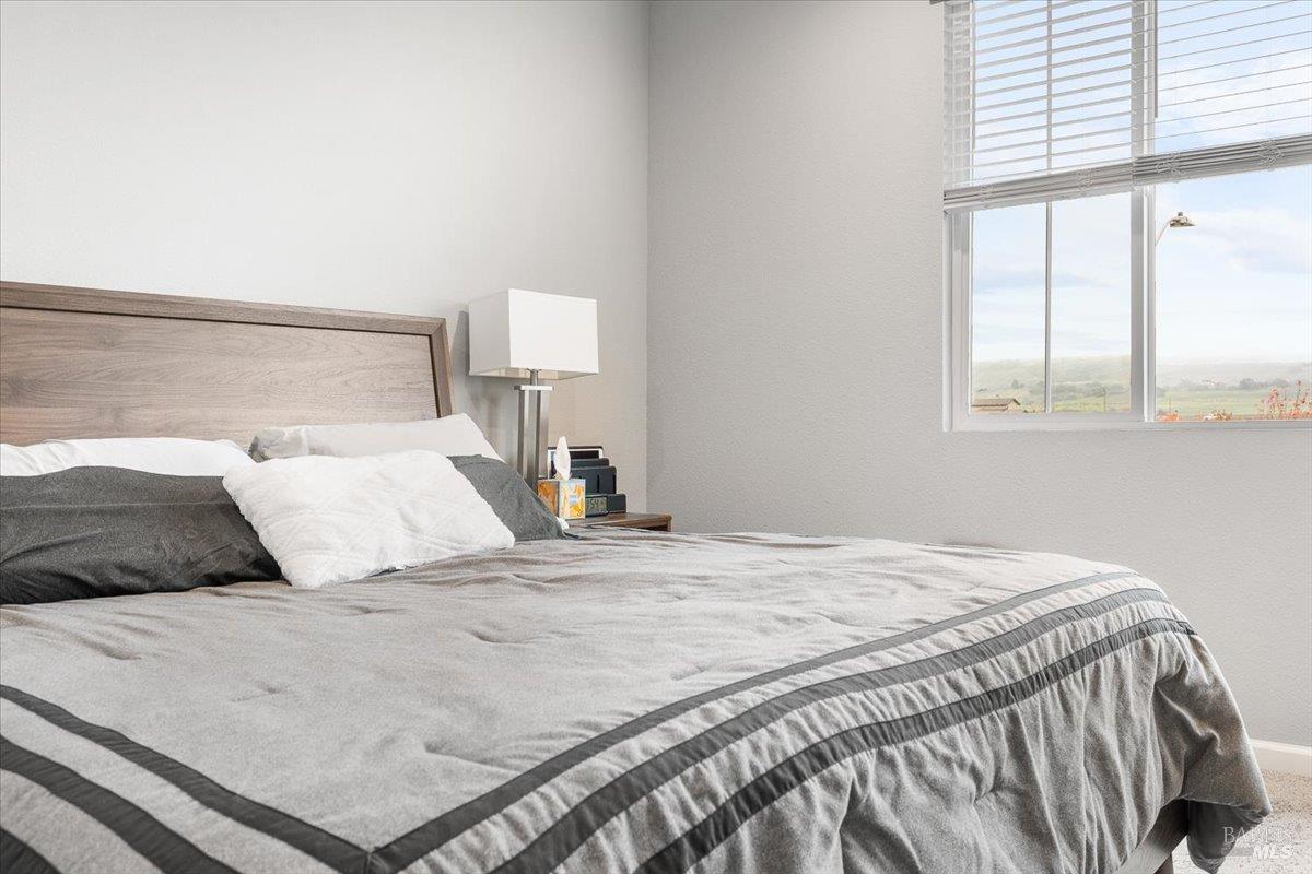 2180 Karen Place Rohnert Park, CA 94928 - Photo 25 of 48 a bedroom with a bed and window