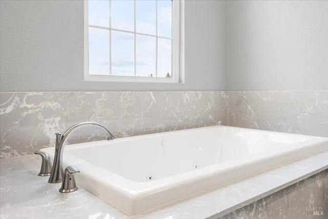 a bathroom with a bathtub