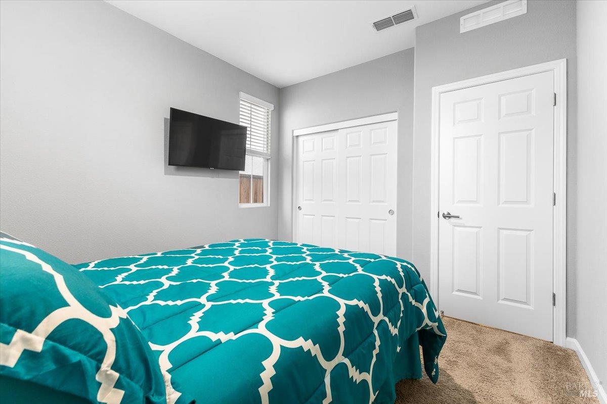 2180 Karen Place Rohnert Park, CA 94928 - Photo 36 of 48 a bedroom with a bed and a television