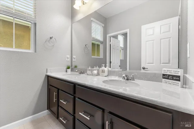 a bathroom with a toilet and shower