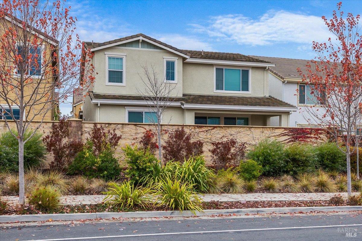 2180 Karen Place Rohnert Park, CA 94928 - Photo 43 of 48 a front view of a house with a yard and potted plants