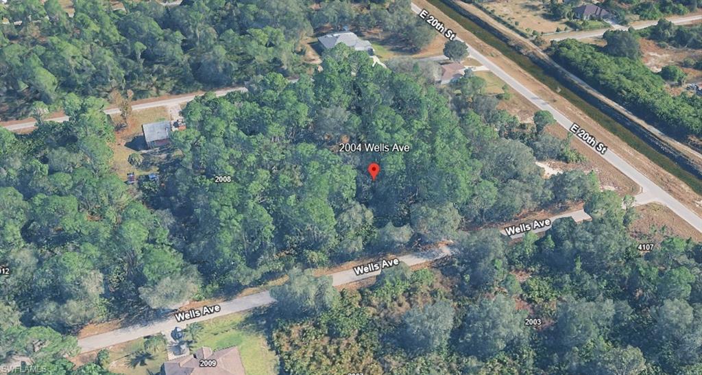 2004 Wells Avenue Alva, FL 33920 - Photo 2 of 4 a view of a forest from balcony