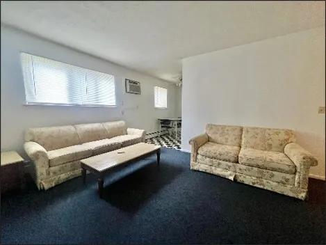 a kitchen with stainless steel appliances a refrigerator and a stove