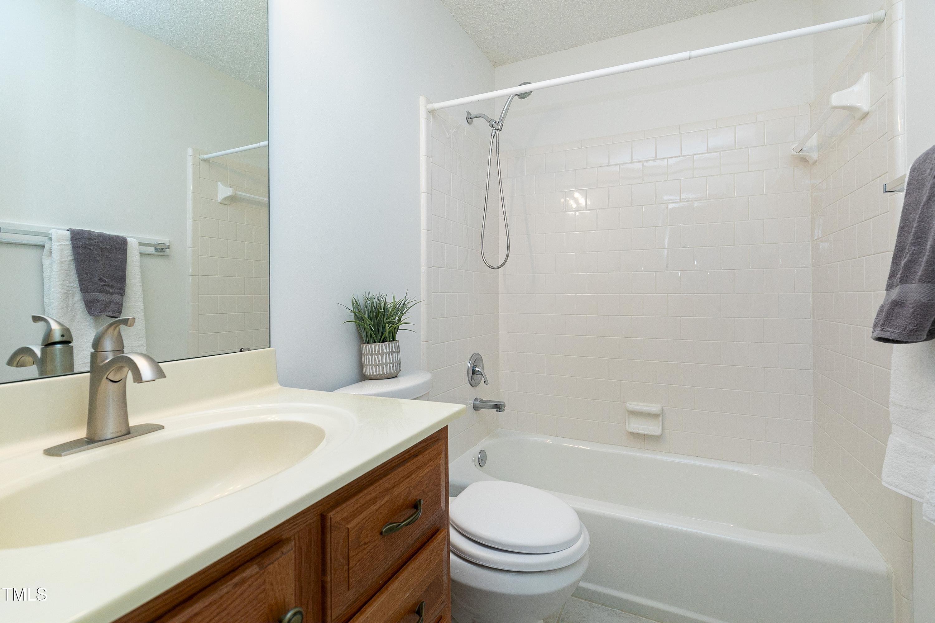 6702 Twin Tree Court Raleigh, NC 27613 - Photo 22 of 30 Master Bath 1
