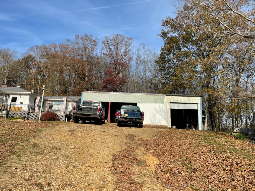 628 Briar Patch Road Prospect, TN 38477 - Photo 5 of 31 a view of a car park in front of house