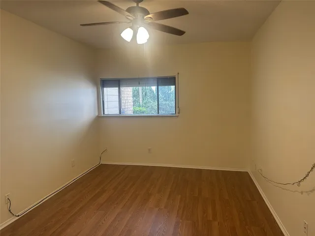 an empty room with a empty space and a window