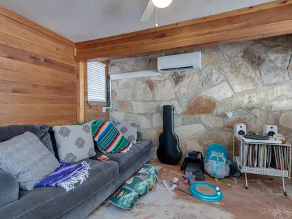 a living room with furniture and a couch