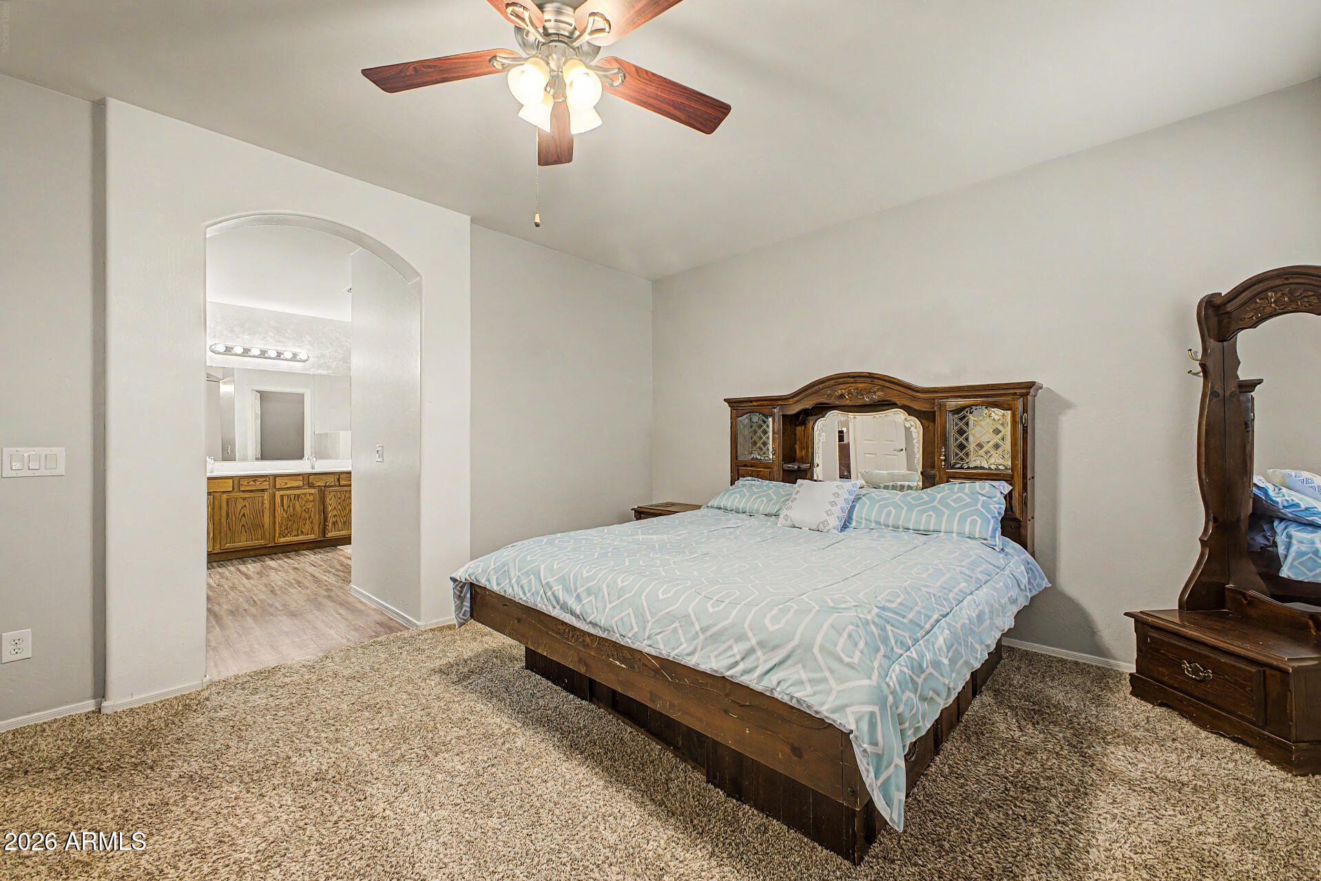 6622 West Harwell Road Laveen, AZ 85339 - Photo 17 of 32 a bedroom with a bed and a television