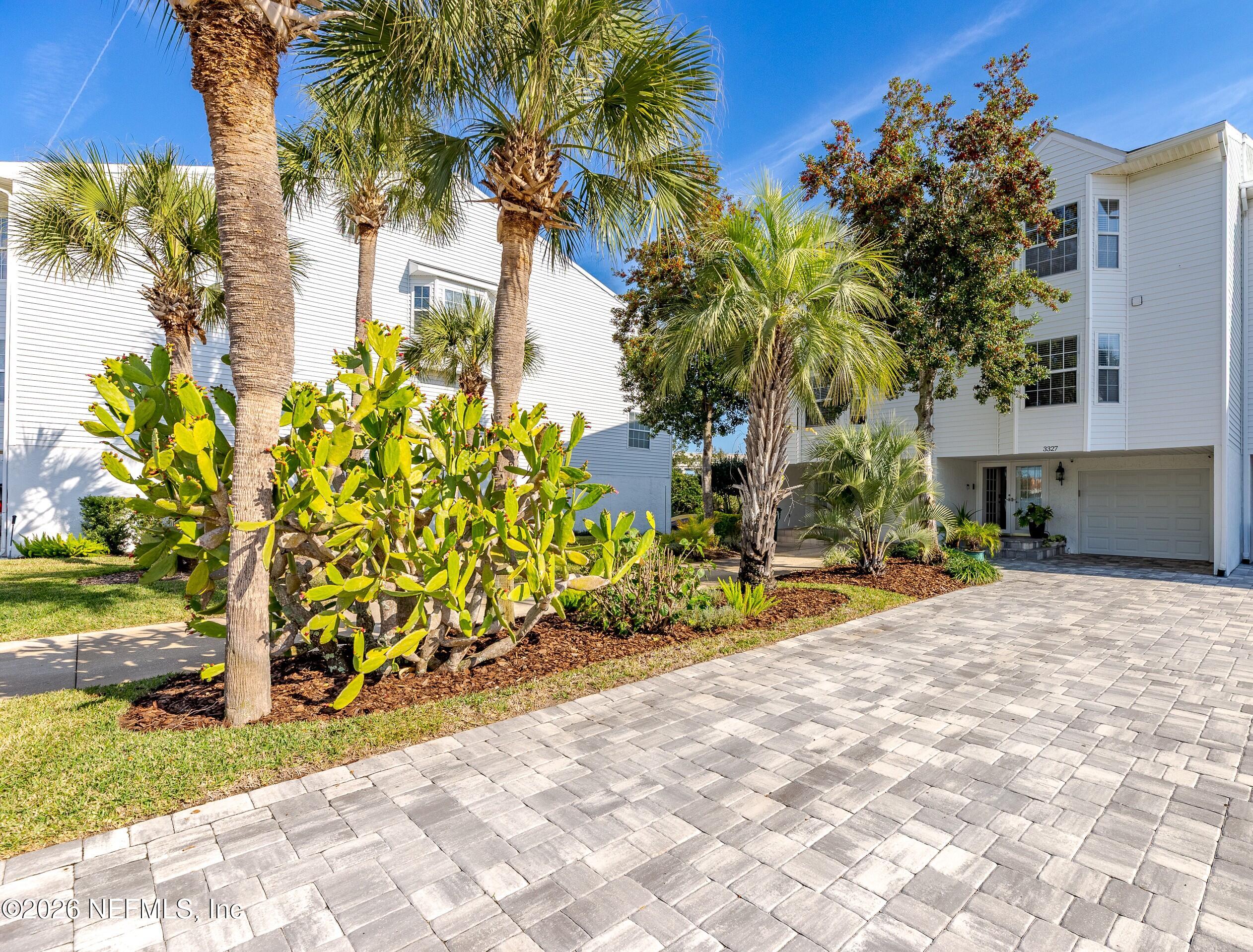 a view of a backyard of the house