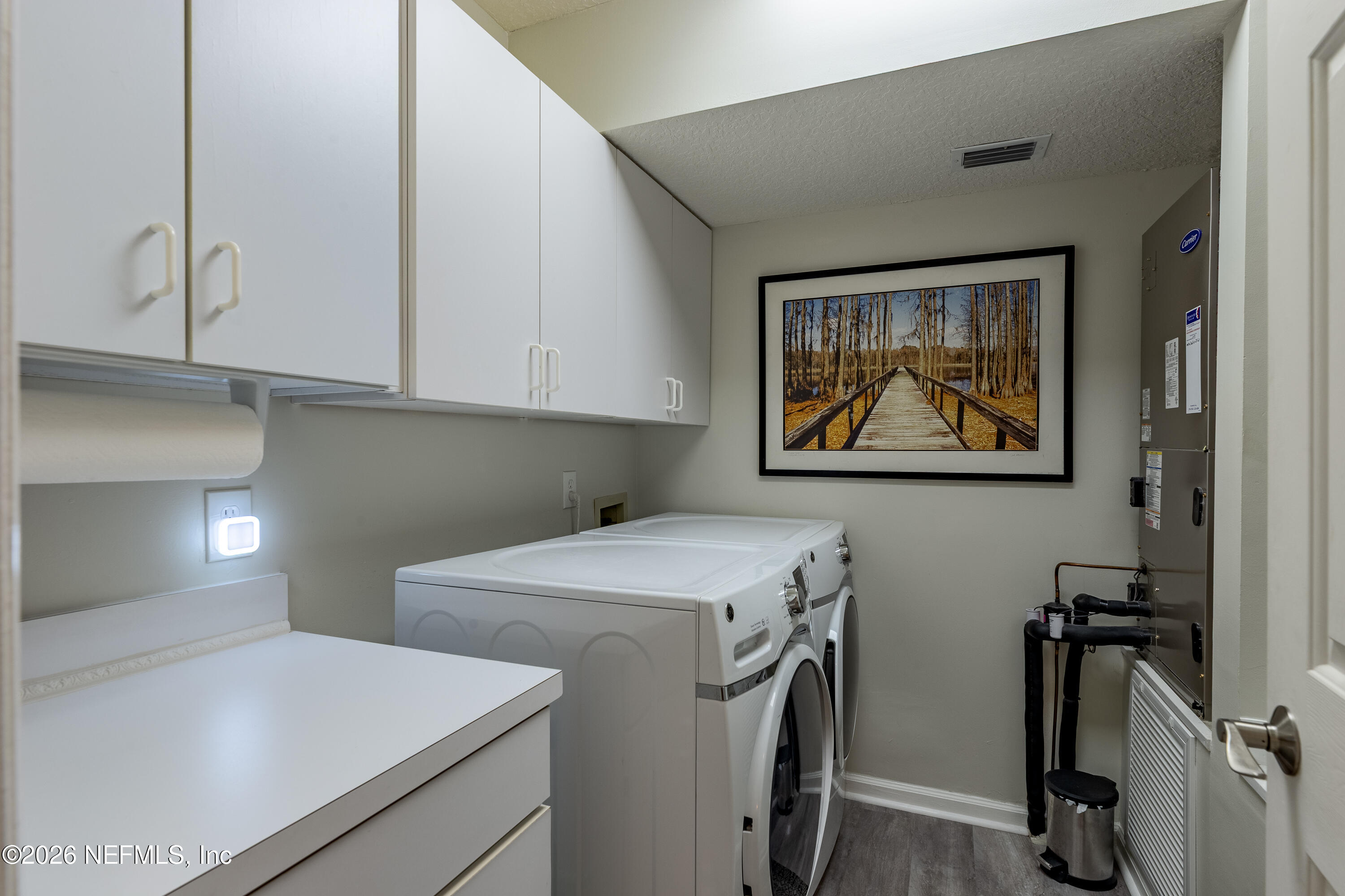 3327 Lighthouse Point Lane Jacksonville, FL 32250 - Photo 15 of 56 a view of room with washer and dryer