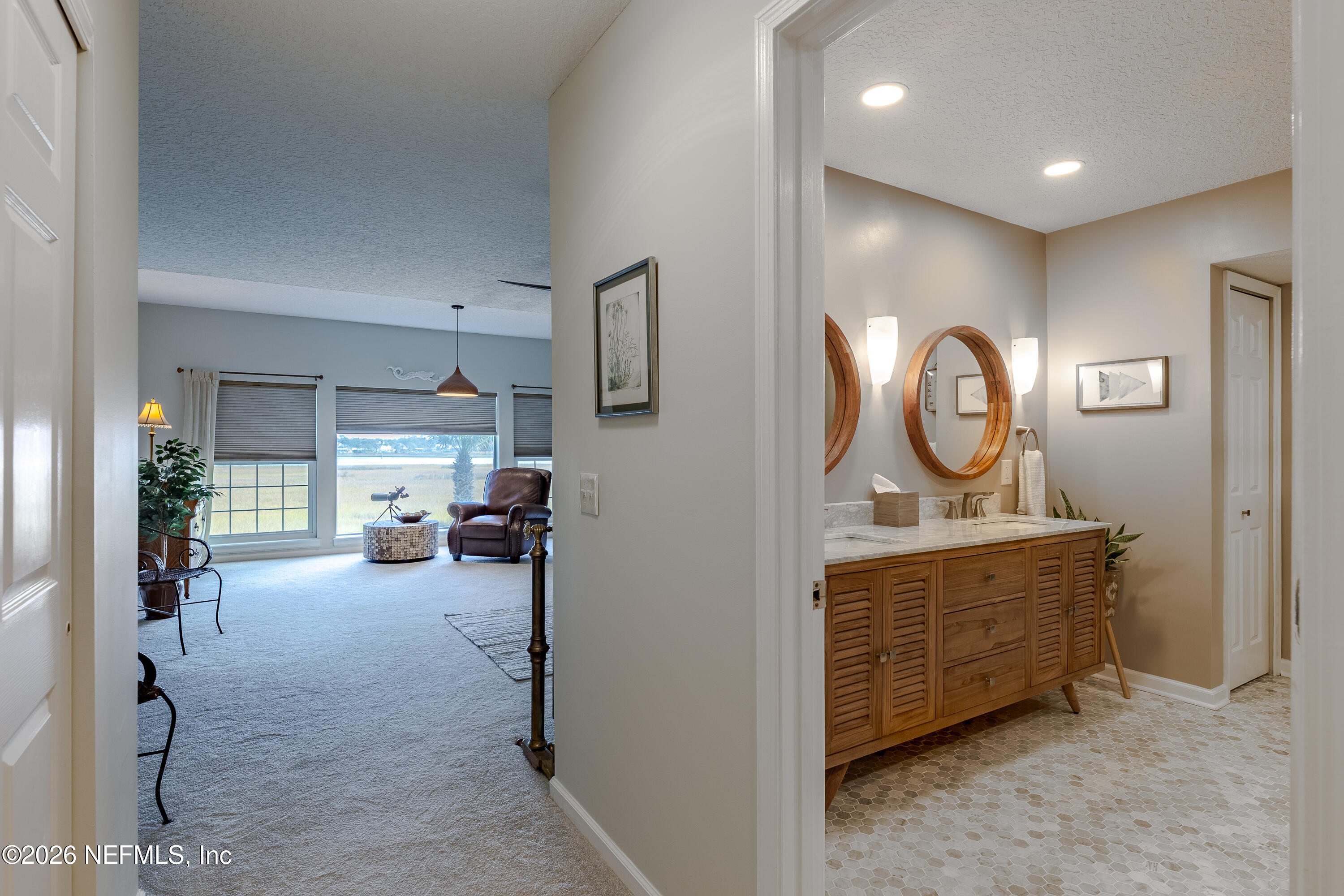 3327 Lighthouse Point Lane Jacksonville, FL 32250 - Photo 16 of 56 a view of a hallway to a livingroom and a livingroom