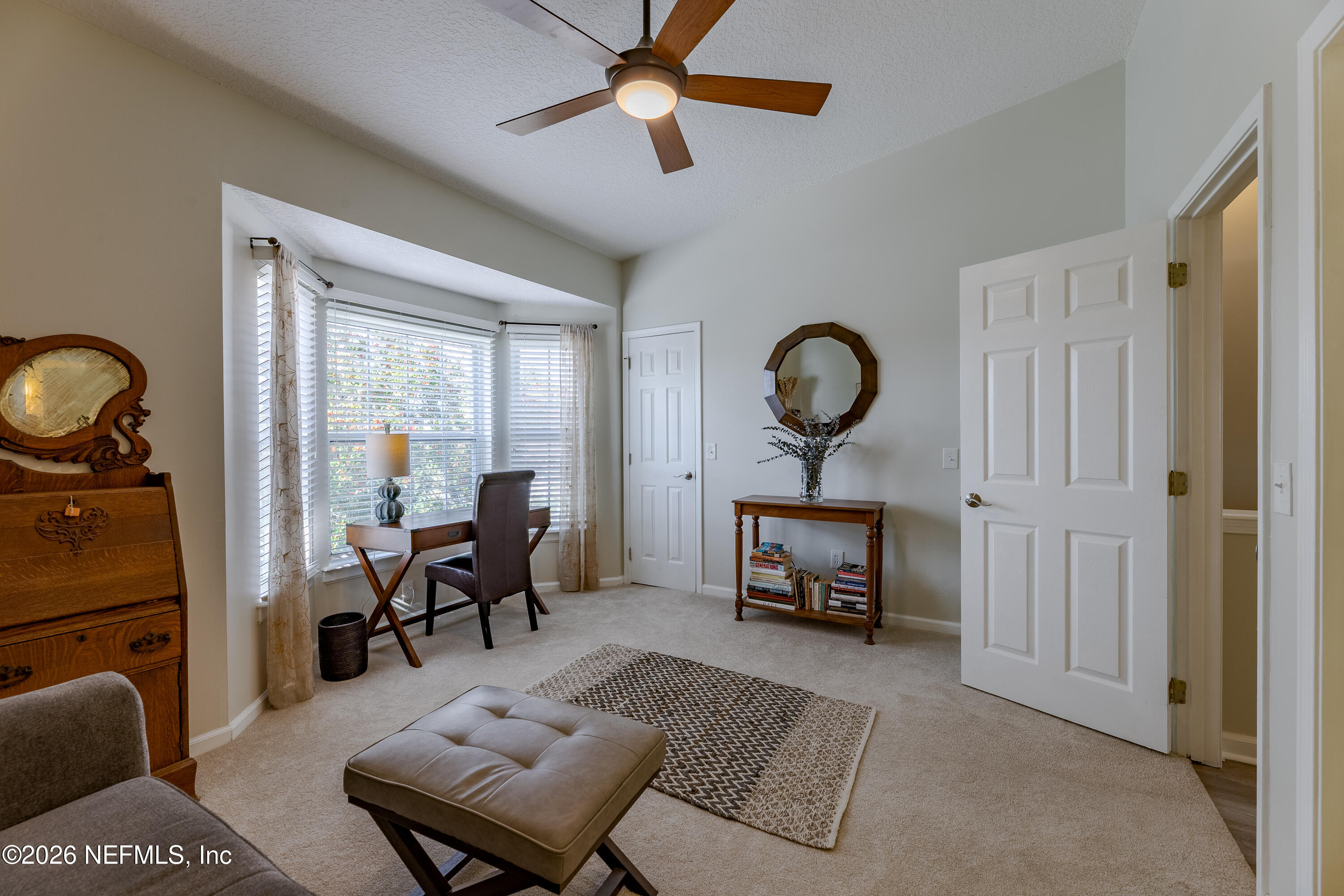 3327 Lighthouse Point Lane Jacksonville, FL 32250 - Photo 37 of 56 a living room with furniture