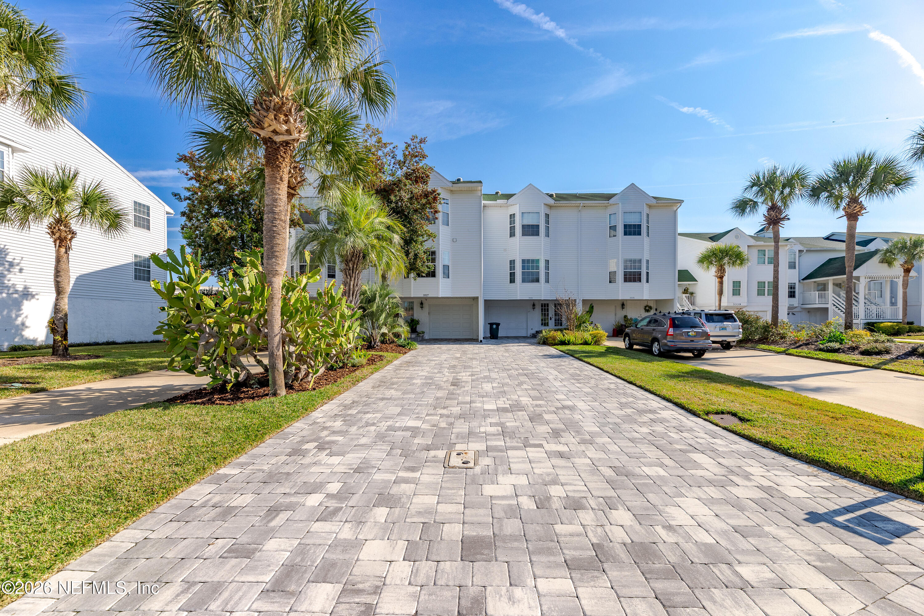 3327 Lighthouse Point Lane Jacksonville, FL 32250 - Photo 47 of 56 a swimming pool with outdoor seating and yard