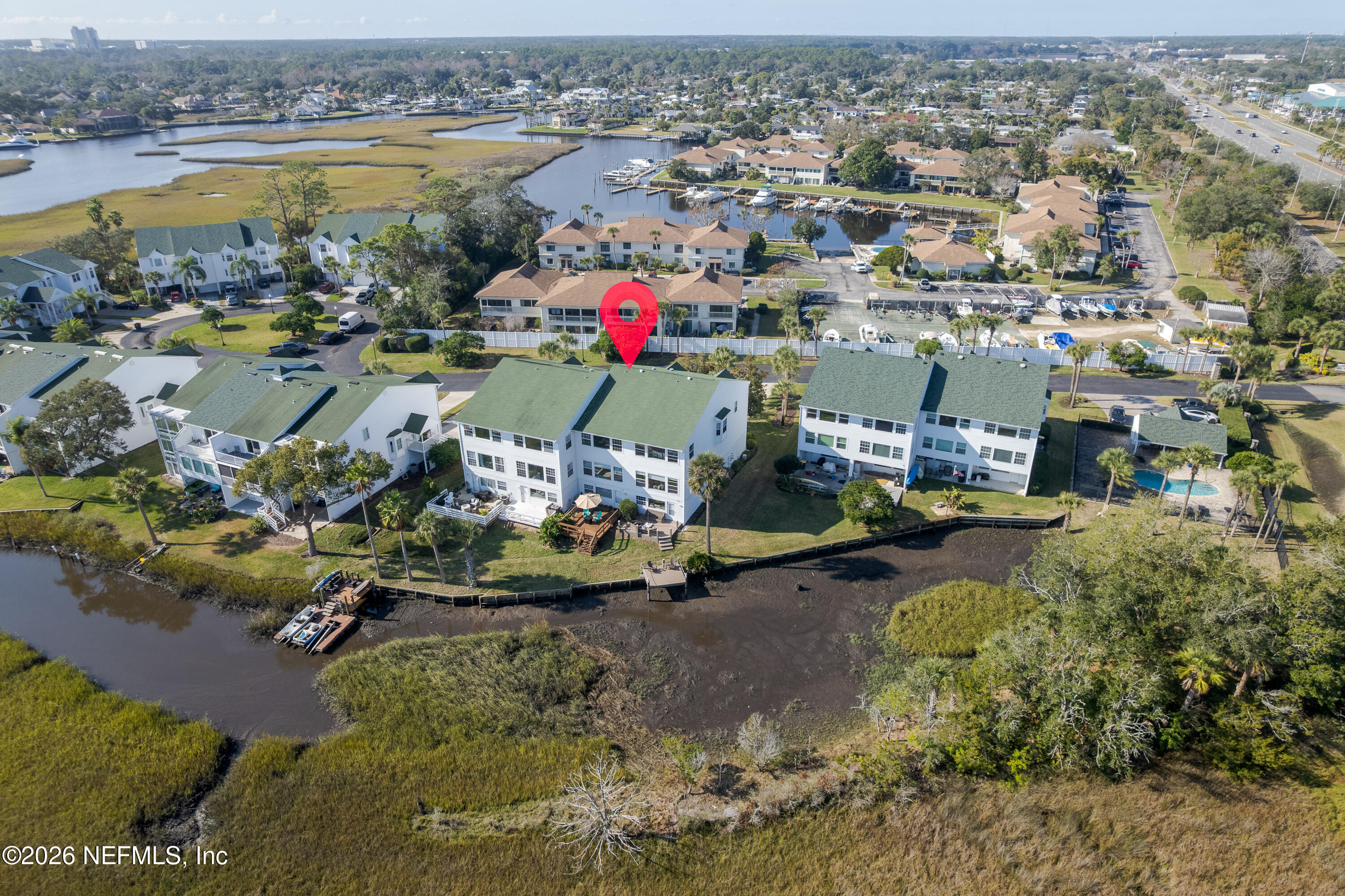 3327 Lighthouse Point Lane Jacksonville, FL 32250 - Photo 5 of 56 an aerial view of a houses with a lake view