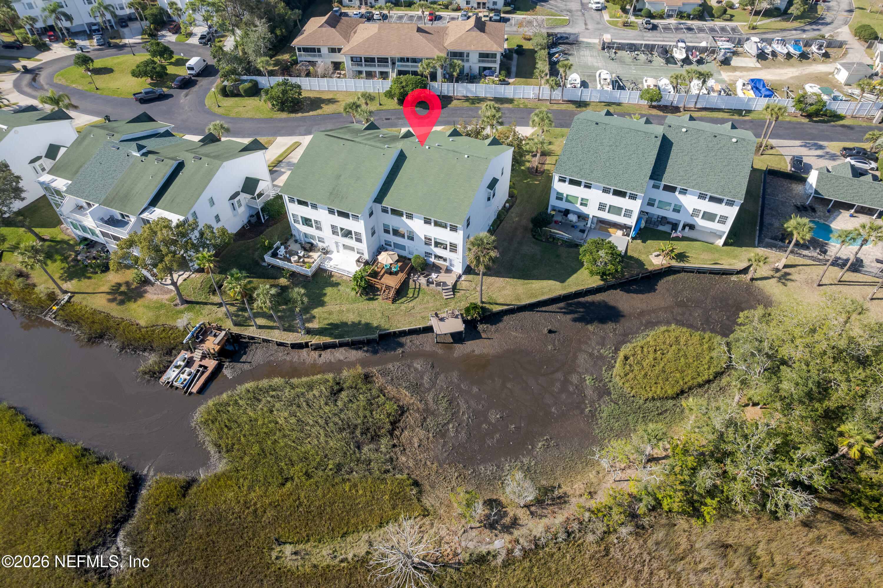 3327 Lighthouse Point Lane Jacksonville, FL 32250 - Photo 55 of 56 an aerial view of a houses with yard