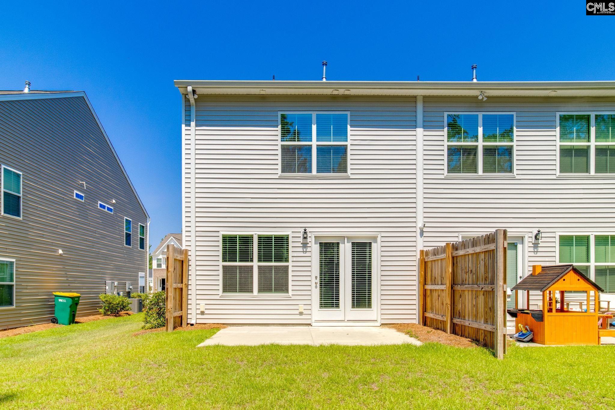 312 Reedmace Court Lexington, SC 29072 - Photo 29 of 29 a view of a house with a backyard