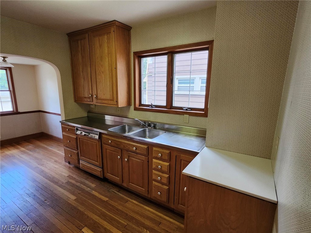 3819 Woodridge Road Cleveland Heights, OH 44121 - Photo 8 of 42 Kitchen featuring sink, dark hardwood / wood-style flooring, and a healthy amount of sunlight
