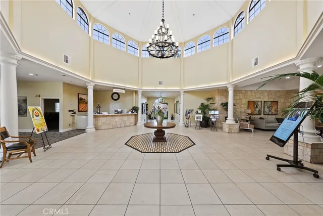 a room with lots of chairs and white walls
