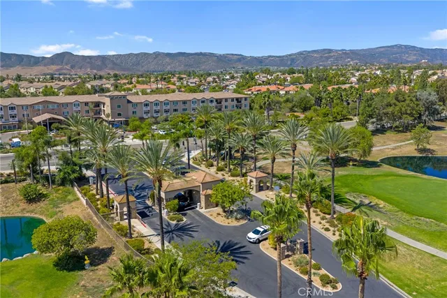 an aerial view of residential house with outdoor space and river