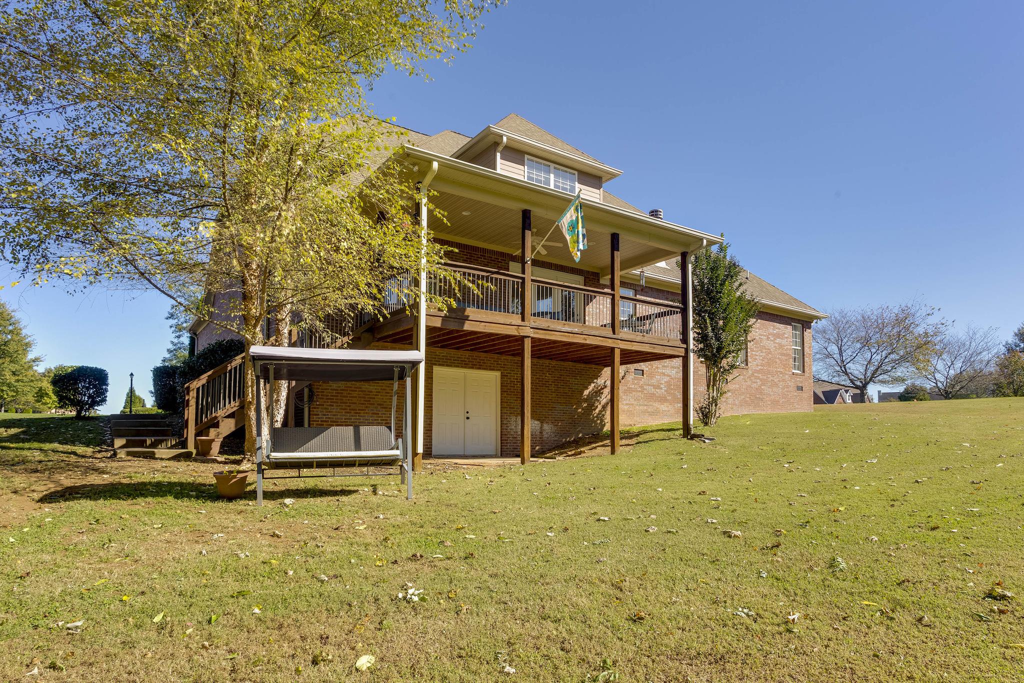 3345 Stillcorn Ridge Road Columbia, TN 38401 - Photo 28 of 30 The Back Deck Can Be Accessed from the Driveway as Well. Double Doors Open to an Unfinished Basement.