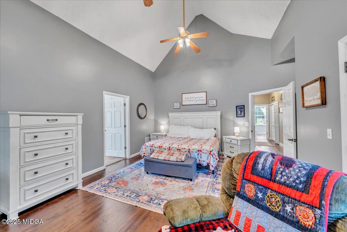 16 Little Collier Road Forsyth, GA 31029 - Photo 22 of 55 a bedroom with a bed and a chandelier