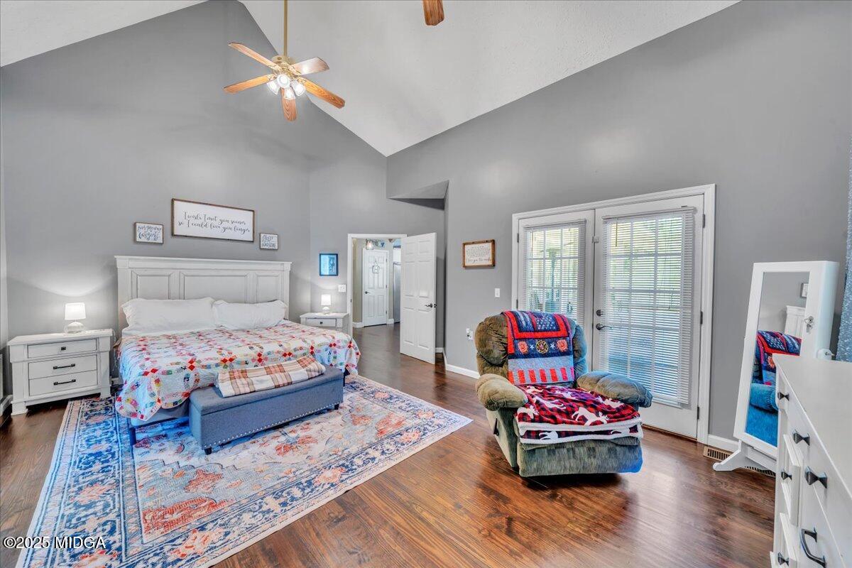 16 Little Collier Road Forsyth, GA 31029 - Photo 23 of 55 a bedroom with furniture and wooden floor