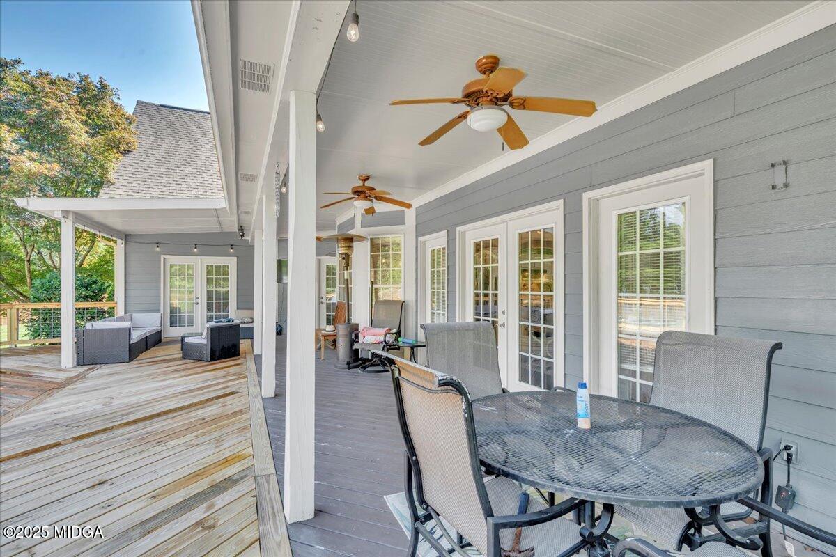 16 Little Collier Road Forsyth, GA 31029 - Photo 39 of 55 a view of a dining room with furniture window and outside view