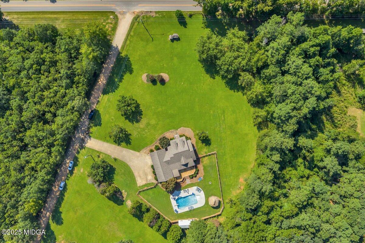 16 Little Collier Road Forsyth, GA 31029 - Photo 4 of 55 an aerial view of a swimming pool