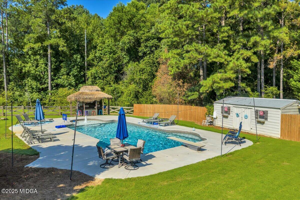 16 Little Collier Road Forsyth, GA 31029 - Photo 44 of 55 swimming pool view with a seating space