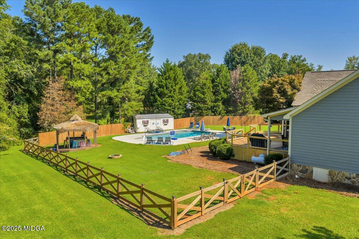 16 Little Collier Road Forsyth, GA 31029 - Photo 48 of 55 a view of a pool with chairs