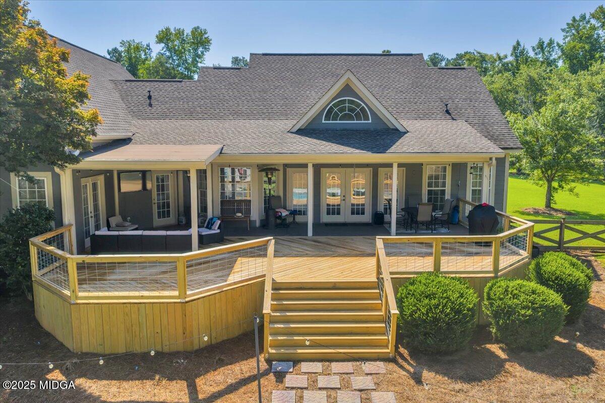 16 Little Collier Road Forsyth, GA 31029 - Photo 49 of 55 an aerial view of a house with swimming pool and glass windows