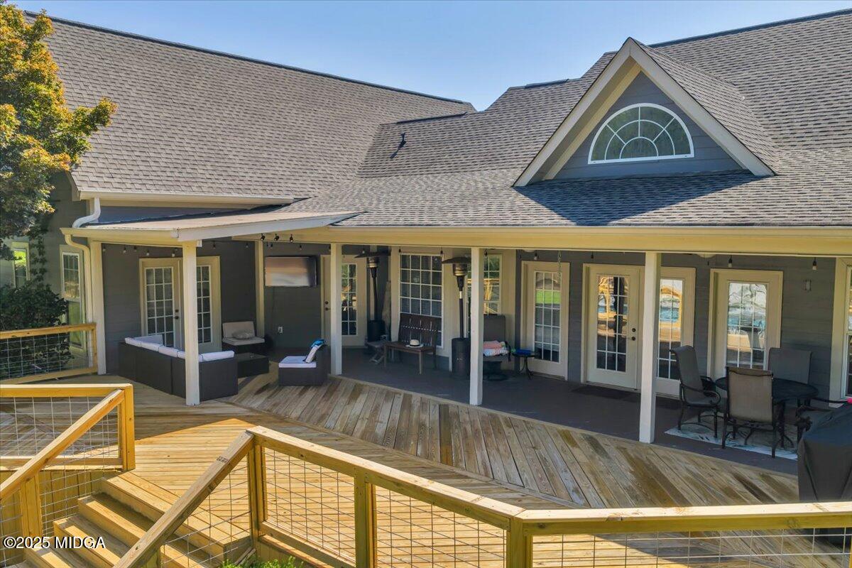 16 Little Collier Road Forsyth, GA 31029 - Photo 50 of 55 a view of a house with a swimming pool and a porch