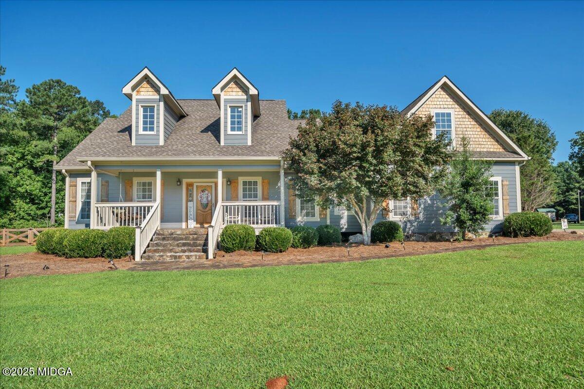 16 Little Collier Road Forsyth, GA 31029 - Photo 51 of 55 front view of a house with a yard