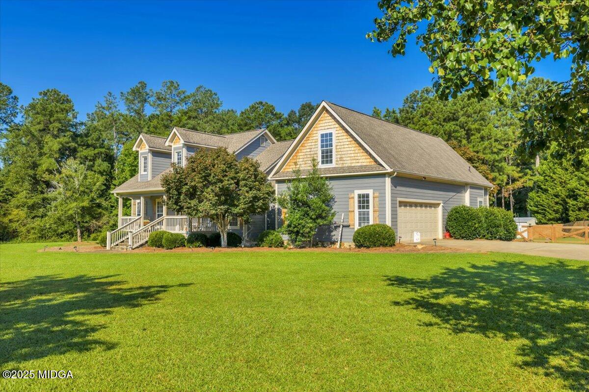 16 Little Collier Road Forsyth, GA 31029 - Photo 54 of 55 a front view of a house with a yard