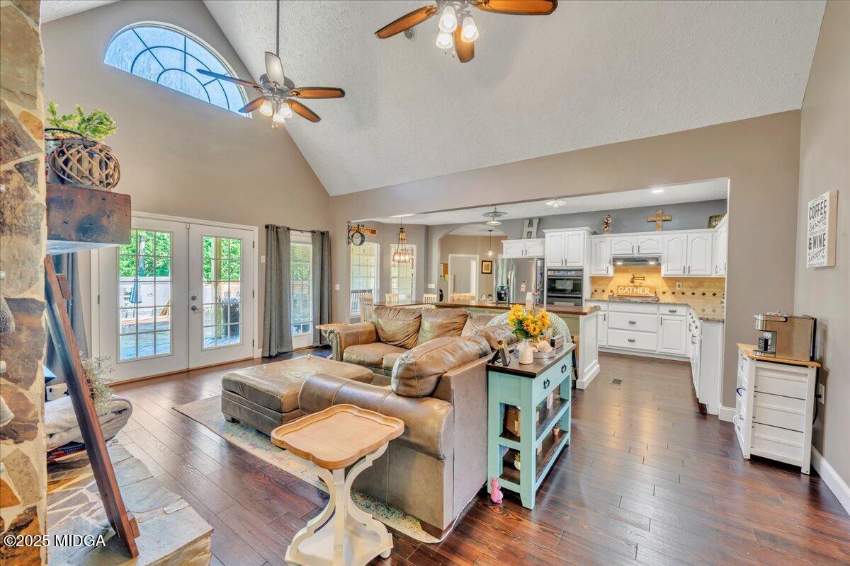 16 Little Collier Road Forsyth, GA 31029 - Photo 7 of 55 a living room with furniture and wooden floor